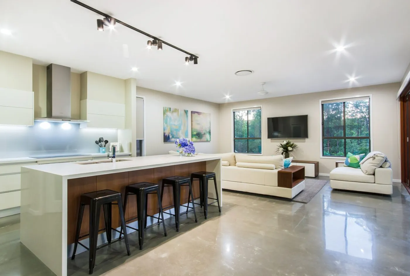 Satin gloss polished concrete floor in a Brisbane residential kitchen and living area