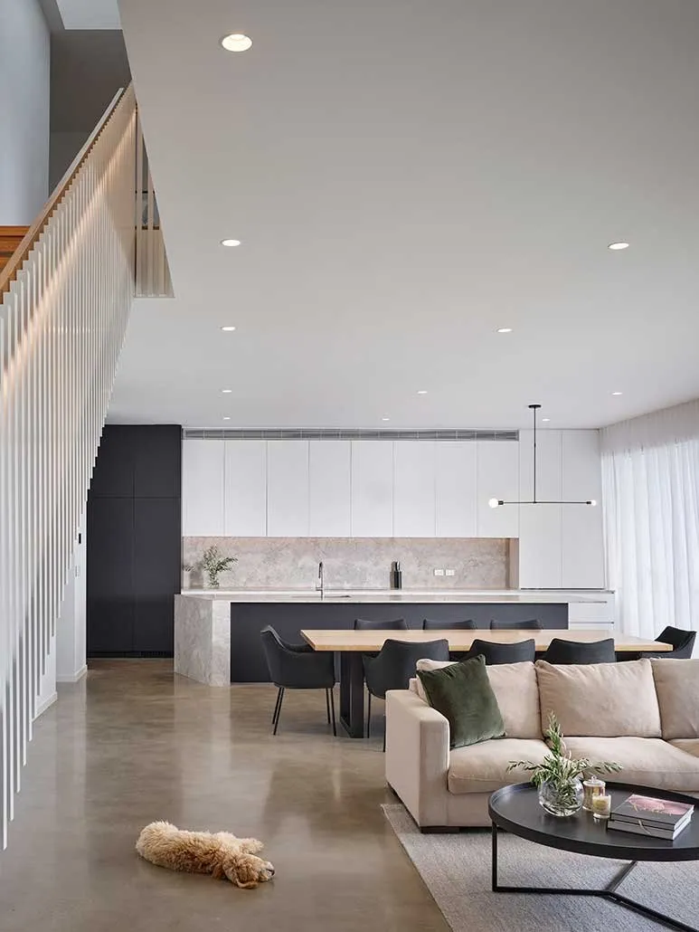 Polished concrete floor in an open-plan Brisbane living and kitchen area